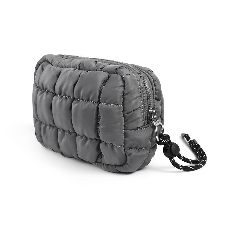 Ash grey puffer wallet with a keychain on a white background