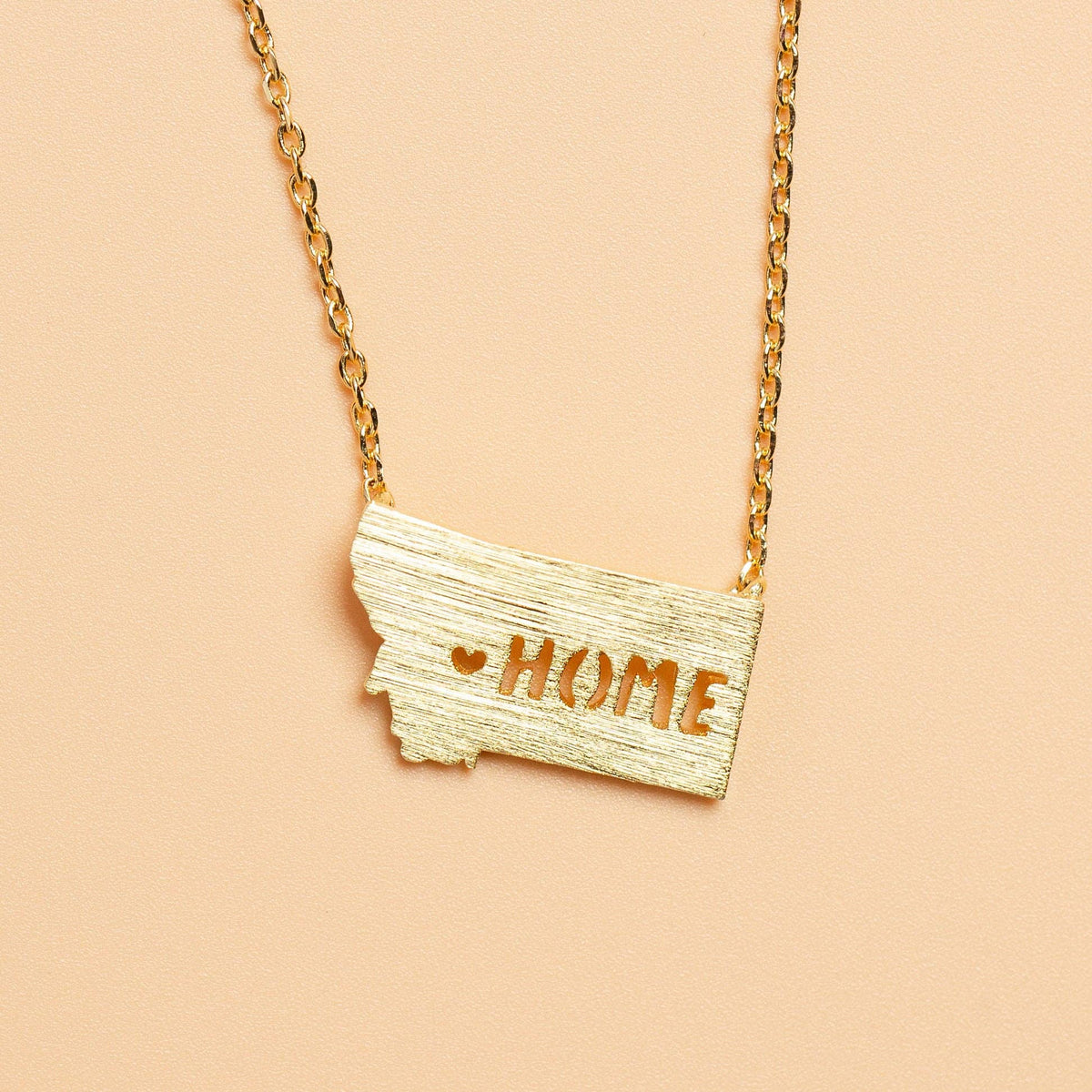 All Hearts Go Home Necklace in Gold