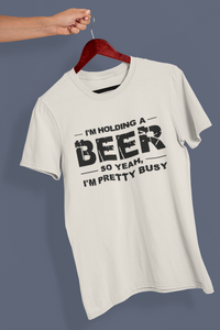 Holding a beer tee